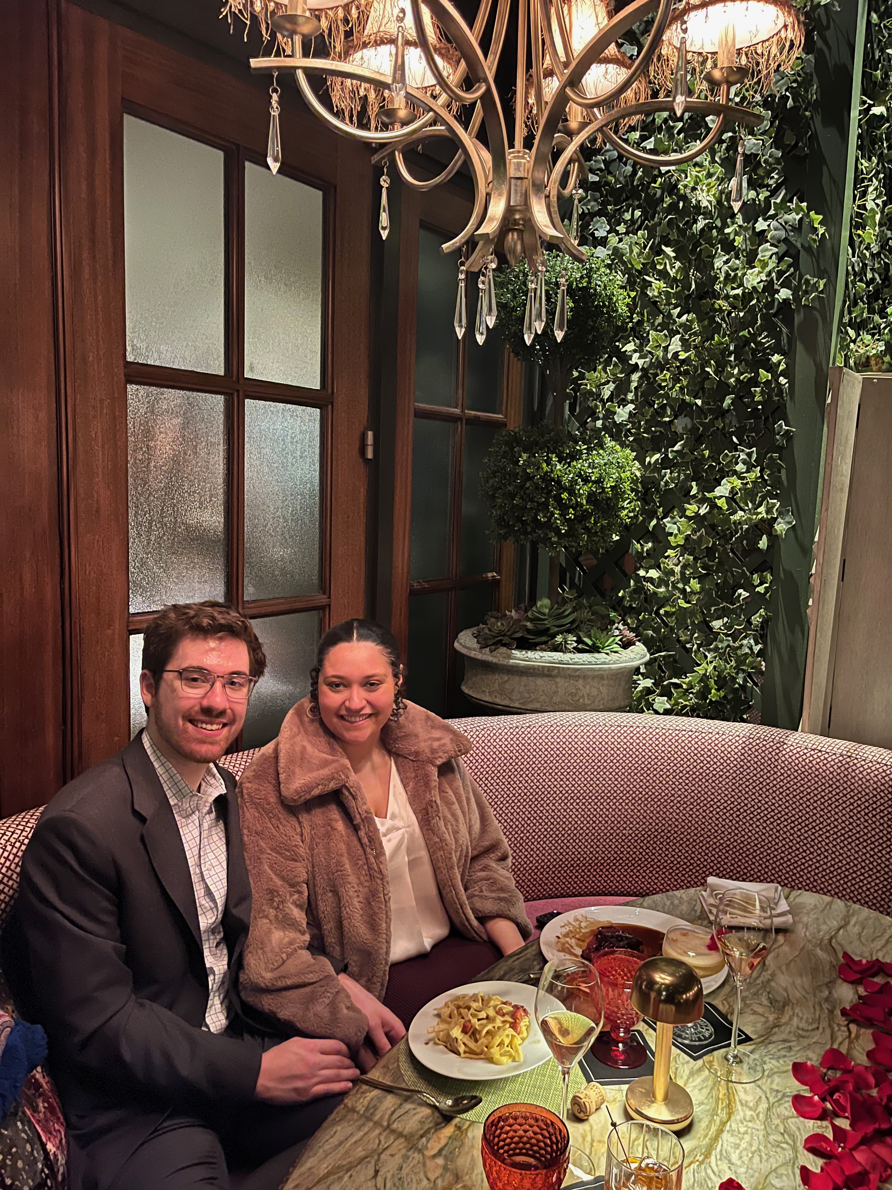 Couple enjoying a special dinner during proposal night